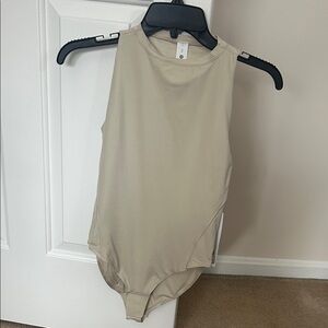 Lululemon Athletica Cream Bodysuit
